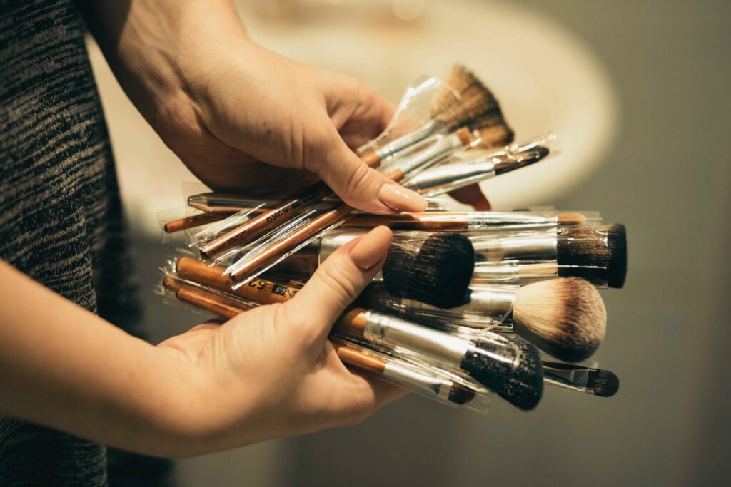 Washing a cruelty-free synthetic makeup brush with soap and water
