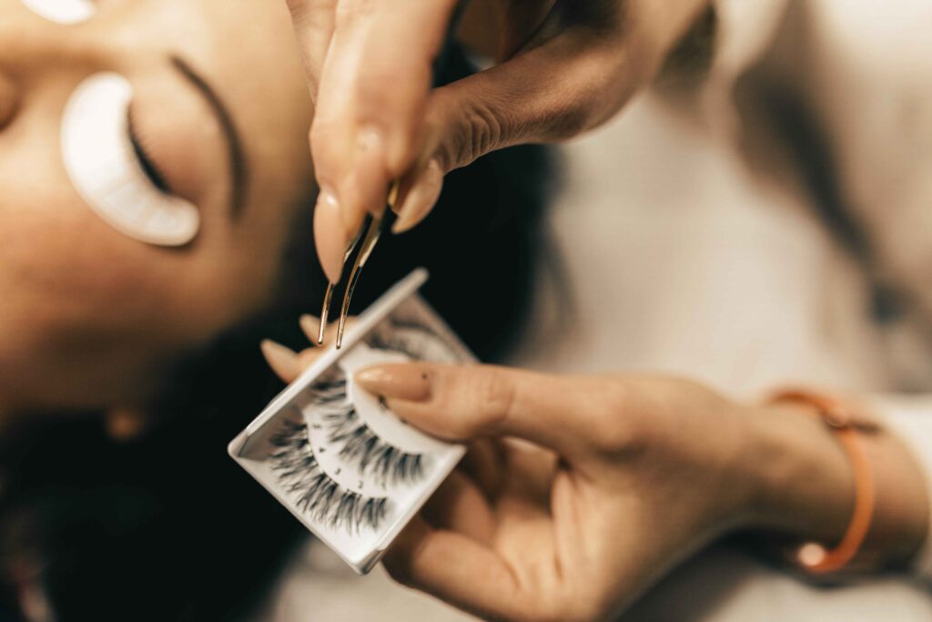 Cruelty-free synthetic false lashes application close-up