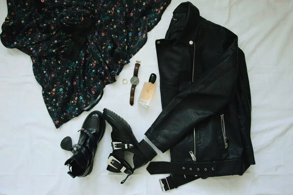 Back to School Outfits for Women: 5 Styles That Work All Day 2 Back to school outfits for women — wardrobe essentials flat lay including denim jacket, leggings, and sneakers