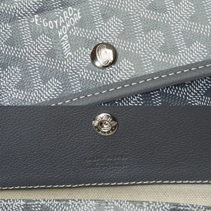 Fake vs Real Goyard: 7 Things That Give It Away Instantly 4 Authentic Goyard Saint Louis pouch silver G button showing clear logo engraving and correct finish