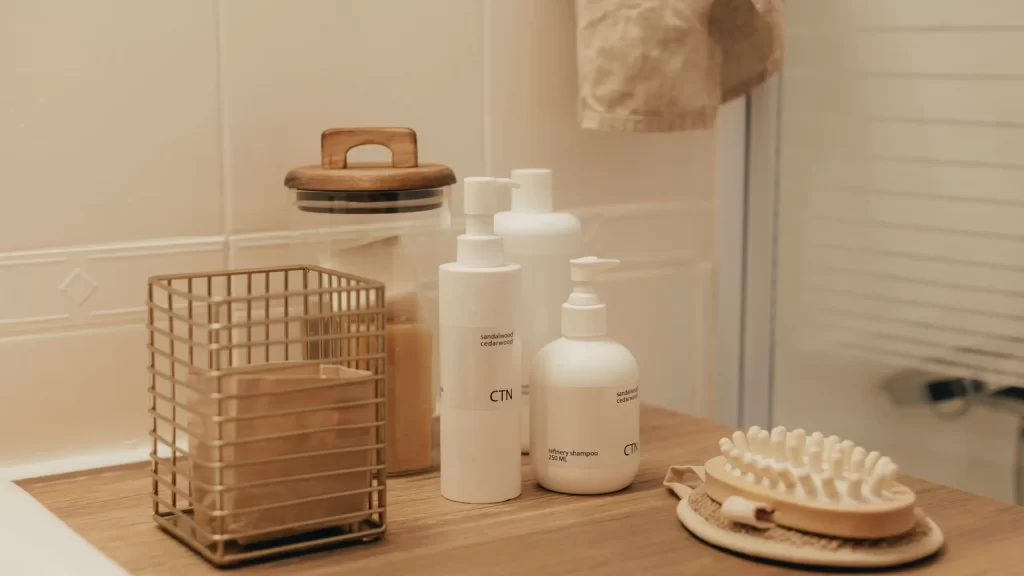 11 Cruelty Free Body Washes Actually Worth Trying 3 Best smelling cruelty free body wash bottles on a shower shelf