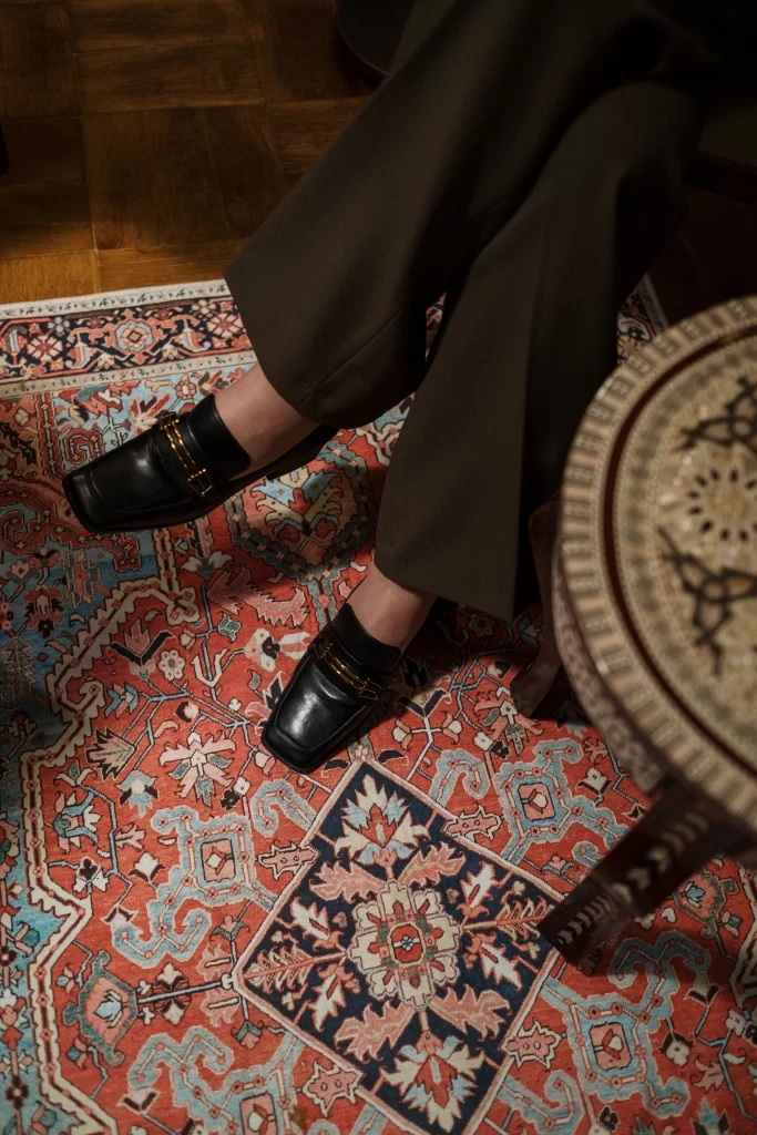 Business Casual Shoes for Women: 10 Picks for the Office 2 Woman wearing business casual loafers walking into the office