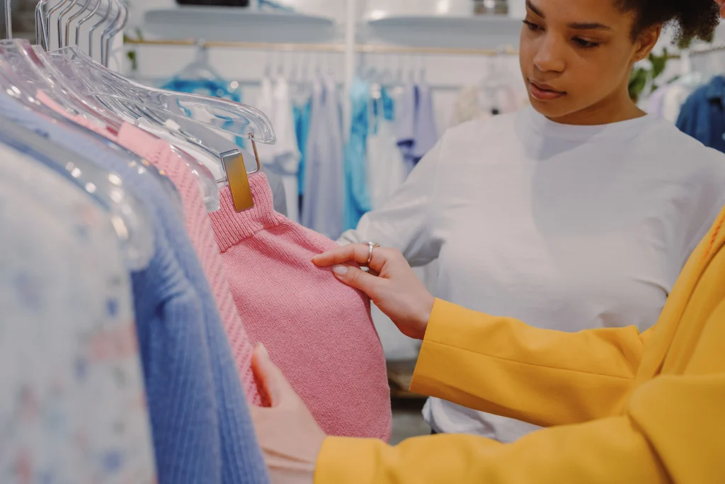 Is VICI Legit? | 7 Similar Boutiques to Try 2 Rack of going out dresses in a boutique fitting area