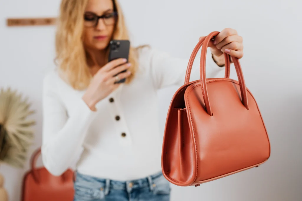 Where to Sell Your Designer Bags: 7 Platforms Compared 2 photographing a designer bag at home for an online resale quote