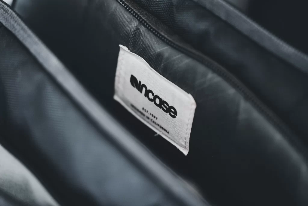 Real vs Fake Leather Bag: How to Tell If It's Real 2 genuine leather label and symbol test on a designer handbag tag