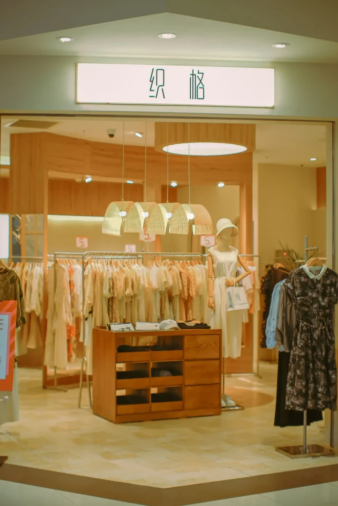 Boutiques Like Altar'd State: 7 Similar Style Picks 3 Inside a locally owned boutique with dress racks and a gift table, similar to Altar'd State stores