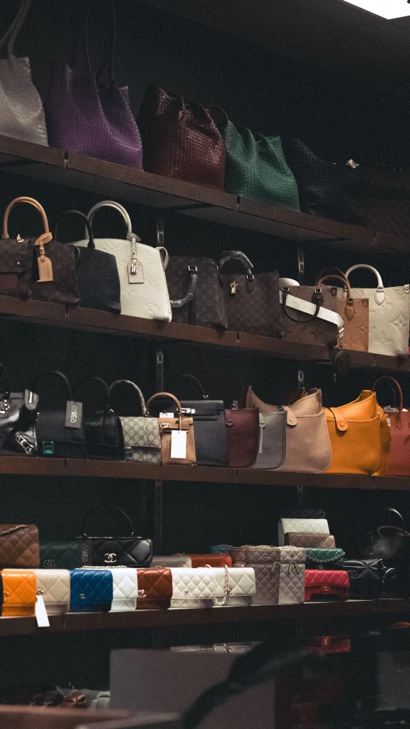 Where to Sell Your Designer Bags: 7 Platforms Compared 1 seven designer bags laid out before deciding where to sell your designer bags