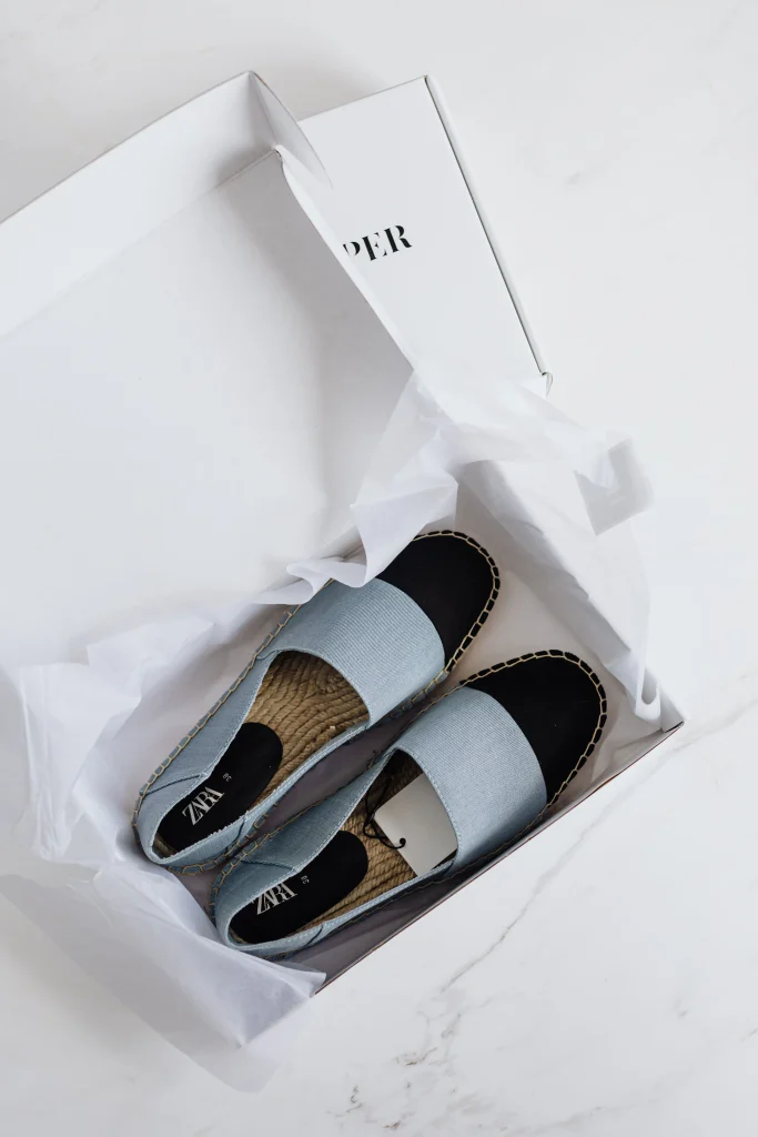 8 Best Shoe Brands Like Steve Madden to Shop 1 Shoe boxes from brands similar to Steve Madden laid out for a side by side comparison