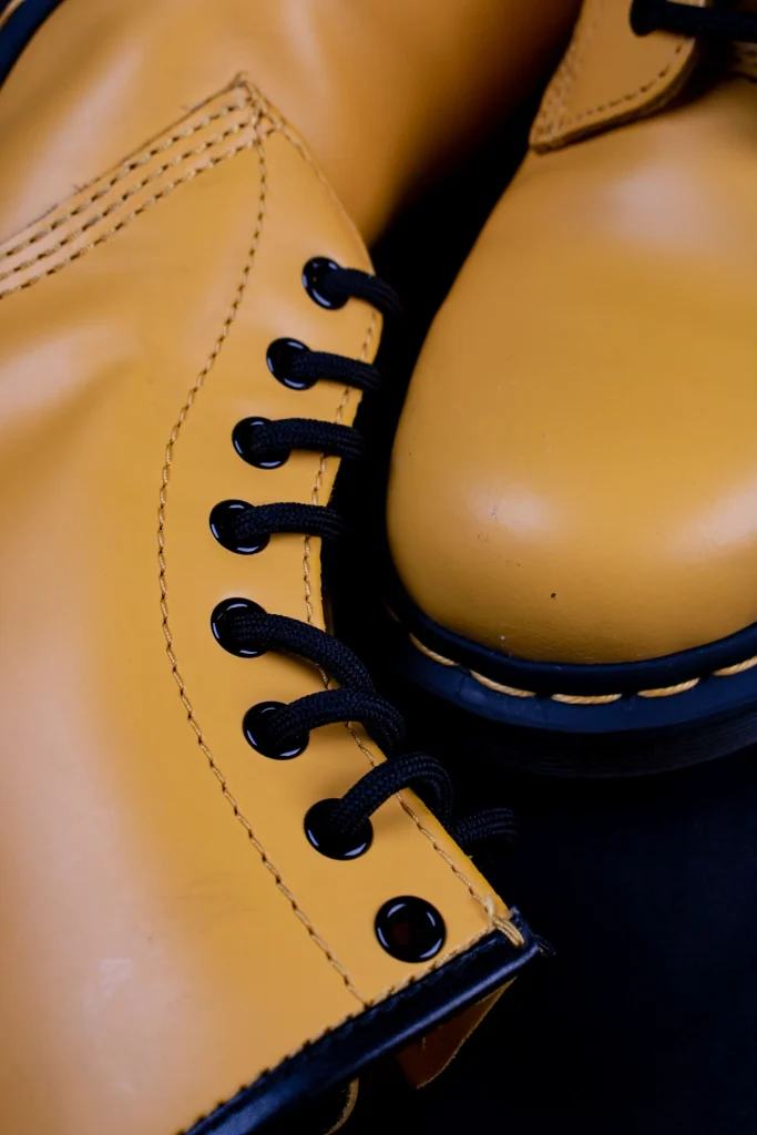 Dr Martens 1460 vs 1461: Which One Should You Buy? 3 Dr Martens 1460 laced with the top two eyelets left open for the break in period