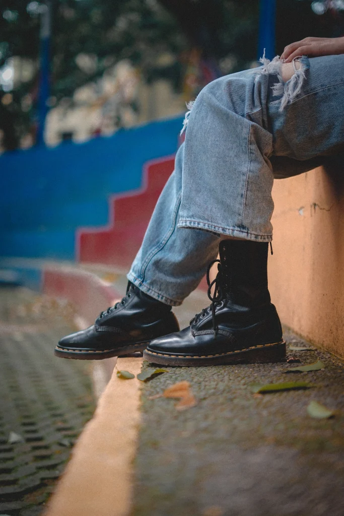 Dr Martens 1460 vs 1461: Which One Should You Buy? 1 Dr Martens 1460 boot and 1461 shoe side by side showing the ankle height difference and matching sole