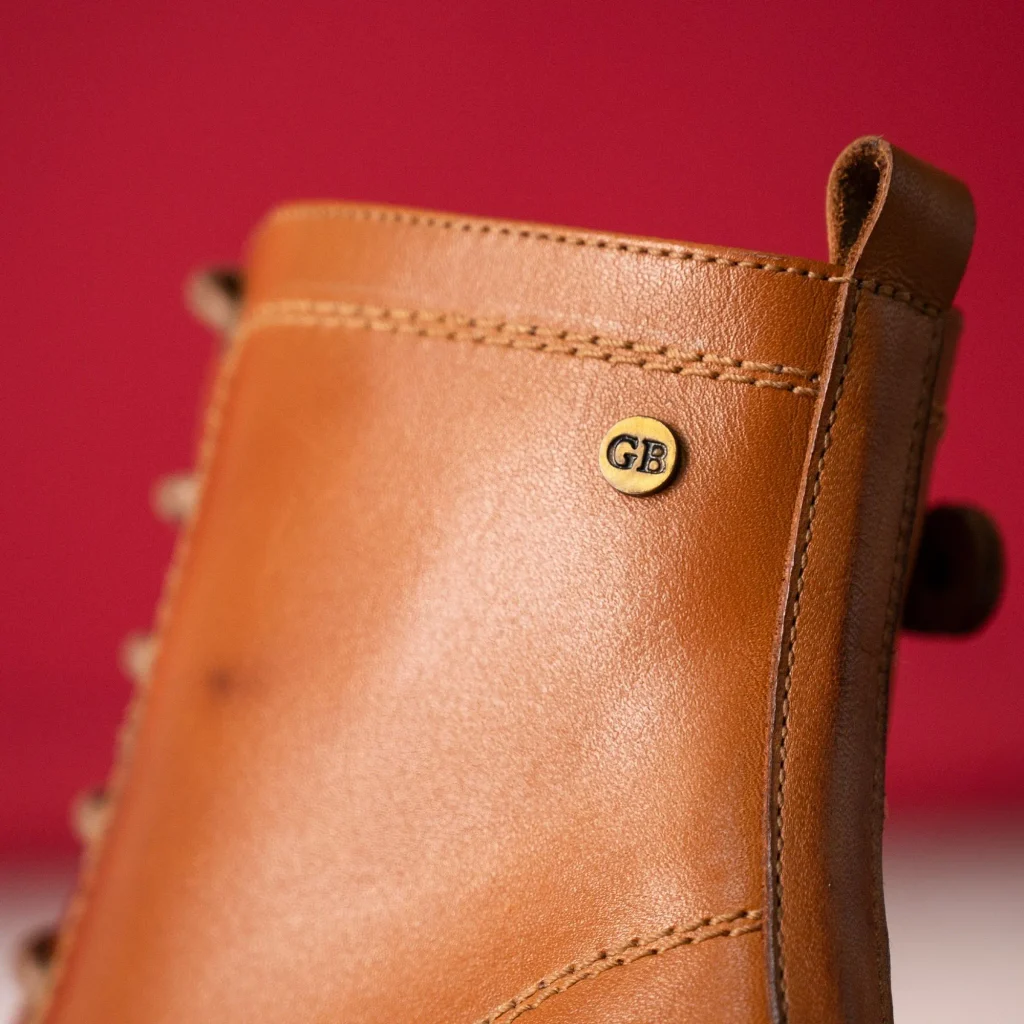 Checking the heel loop and yellow stitching to spot a fake Dr. Martens